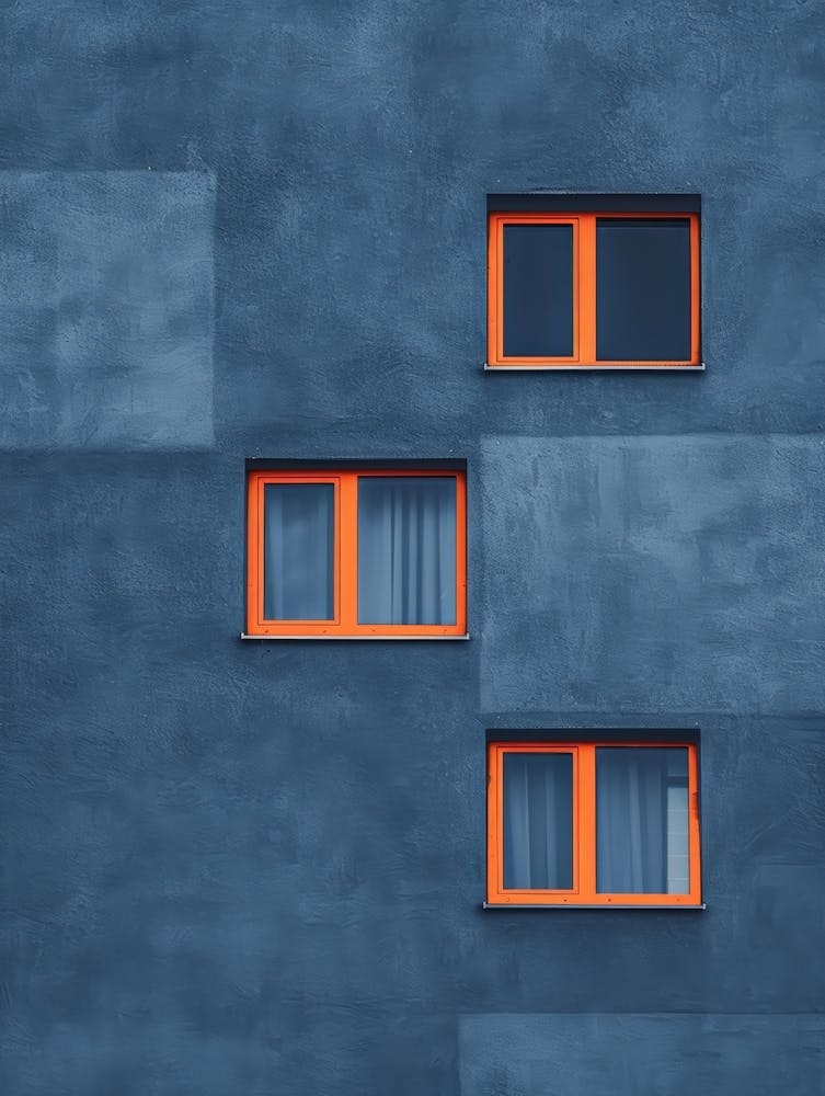 Blue Building With Orange Windows