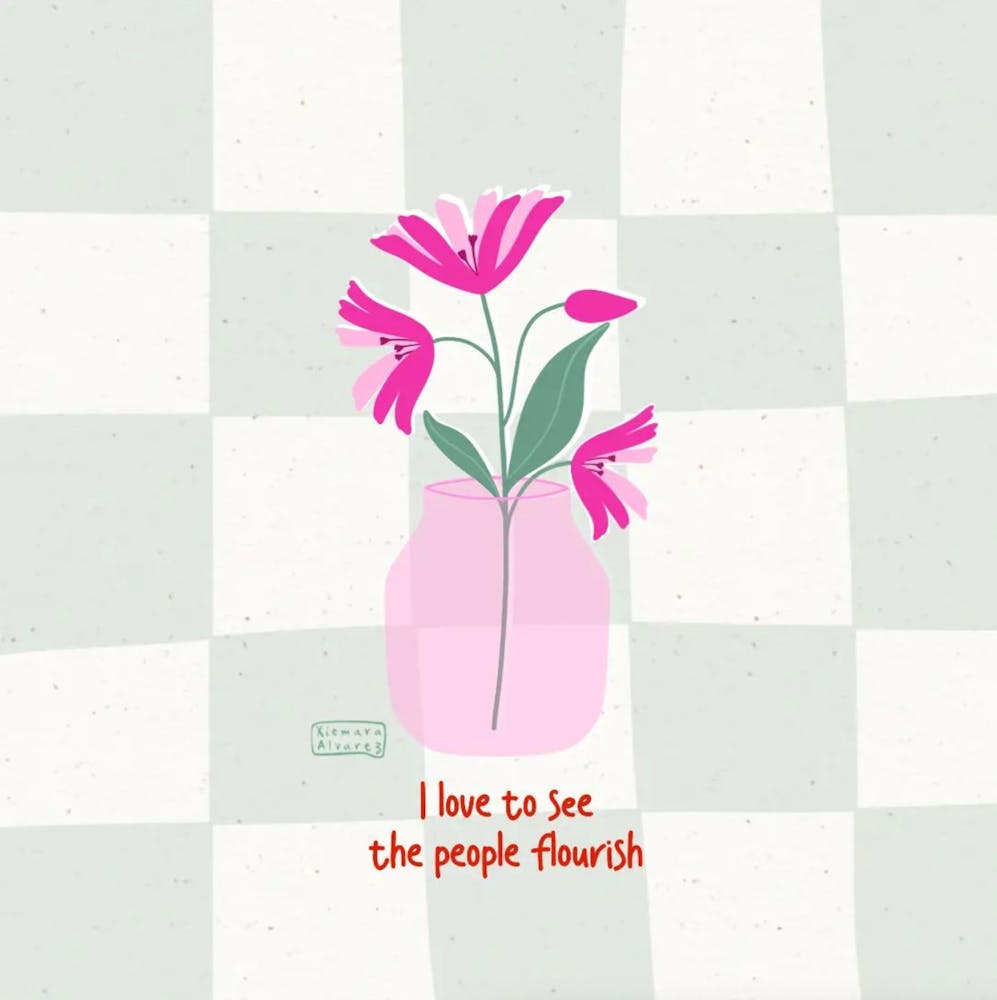 flores en jarron con frase