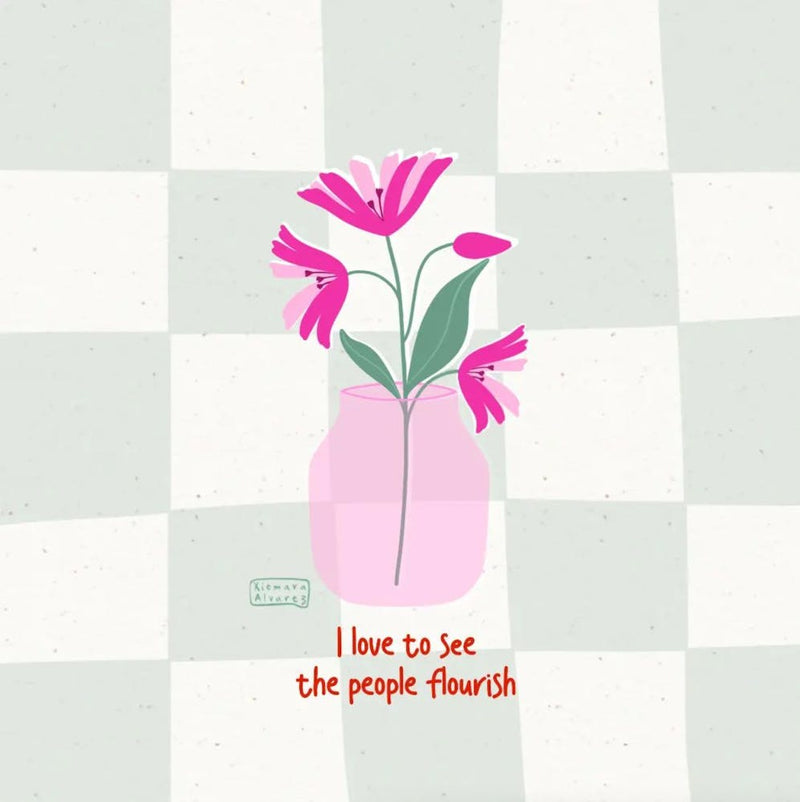 flores en jarron con frase