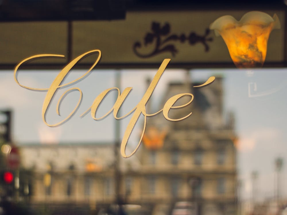 Paris Cafe Sign And Louvre Reflection