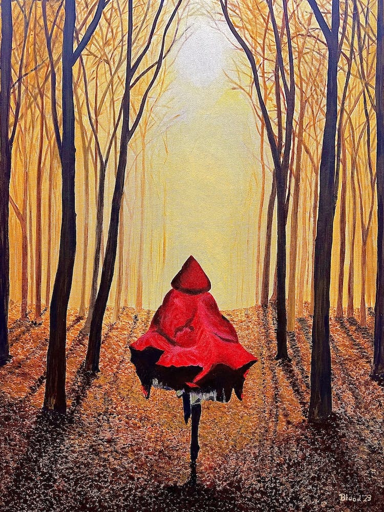 Woman In Red Cape Running In Forest