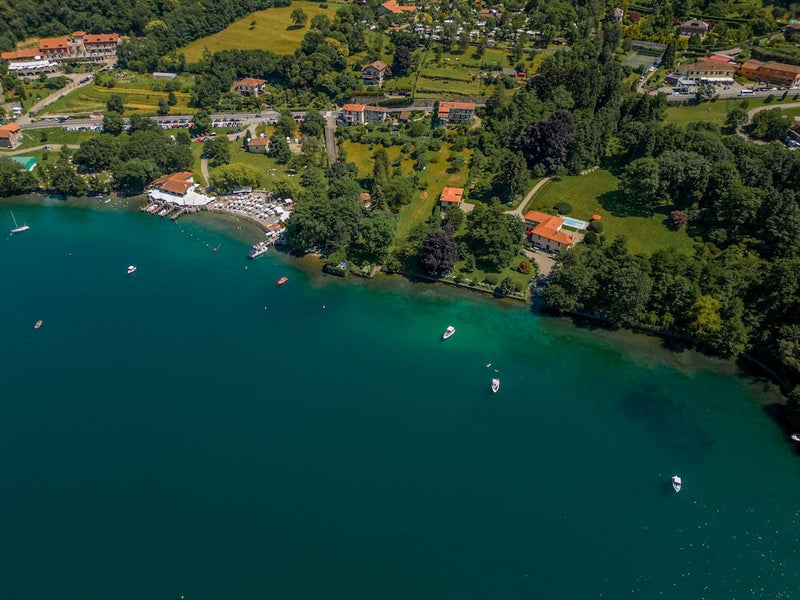 Shoreline on the lake drone photography.  Lake Orta. Italy.