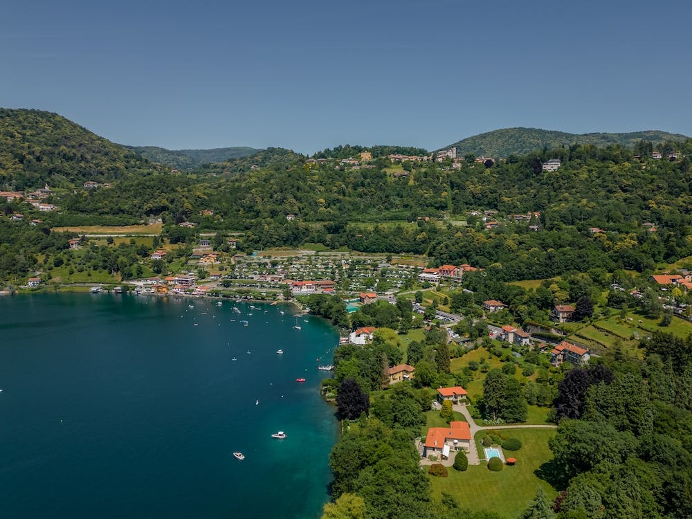 Summer holidays on the lake.  Italy, Piedmont. Lake Orta. Drone photography