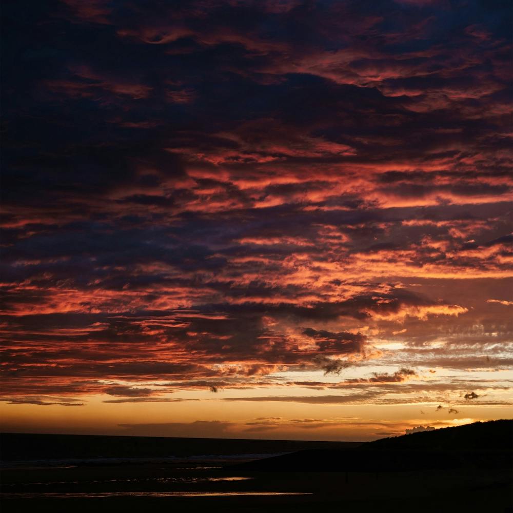 The Pink Orange Yellow Sunset In The Clouds Square