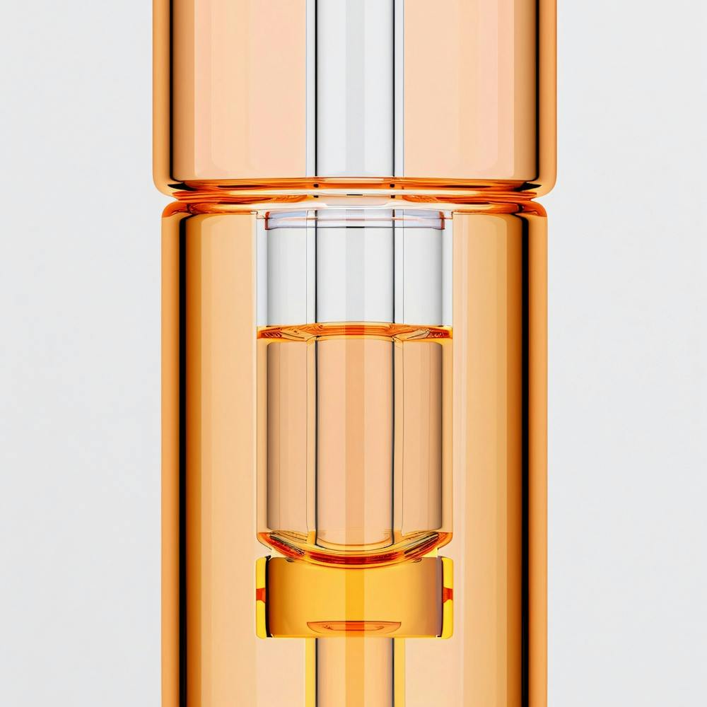 Bottle Of Orange Liquid