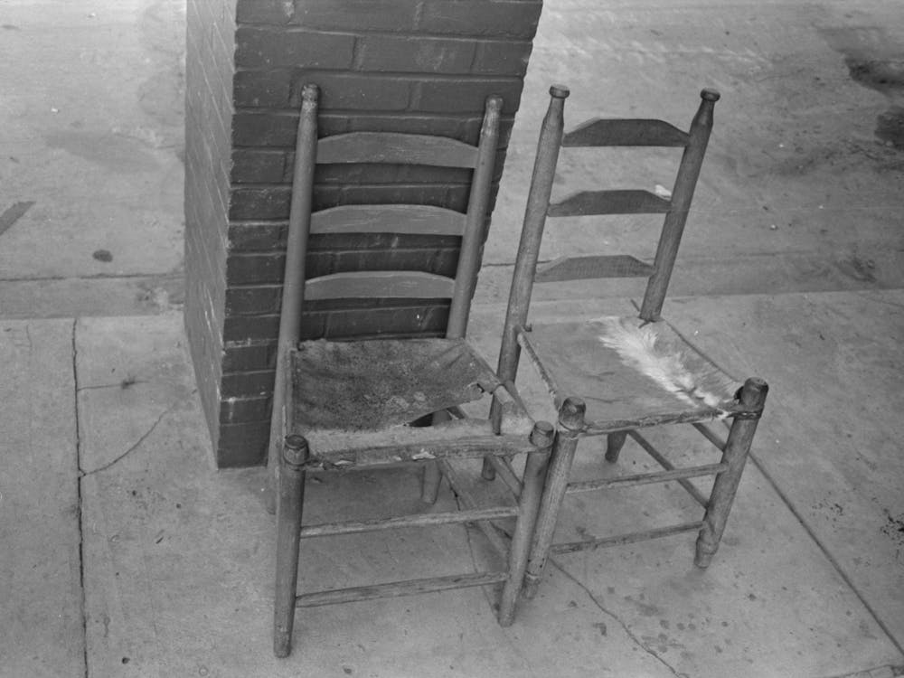 Chairs In Front Of Hotel, With Seats Made Of Stretched Tanned Hide, Crowley, Louisiana By Russell Lee
