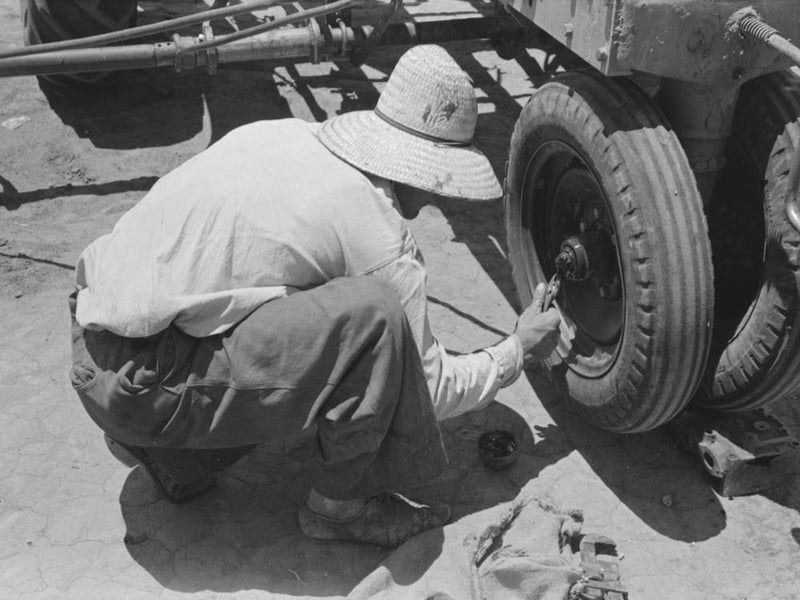 Day Laborer Putting In Cotter Pin In Front Of Tractor, Farm Near Ralls, Texas By Russell Lee