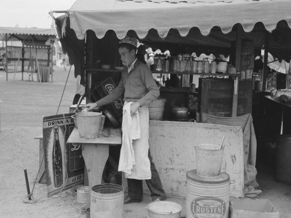 Dishwasher At Hamburger Stand, County Fair, Gonzales, Texas By Russell Lee