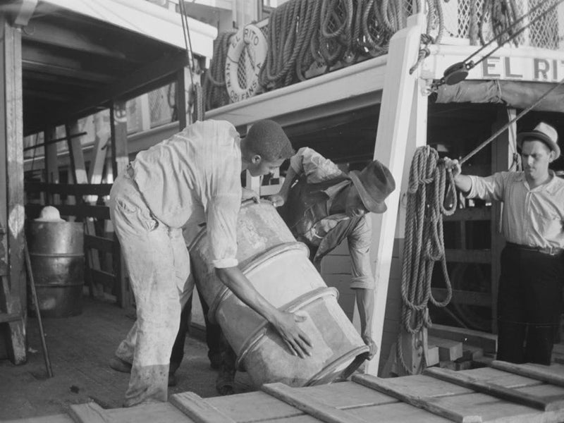 Stevedores Handling Drum, New Orleans, Louisiana By Russell Lee