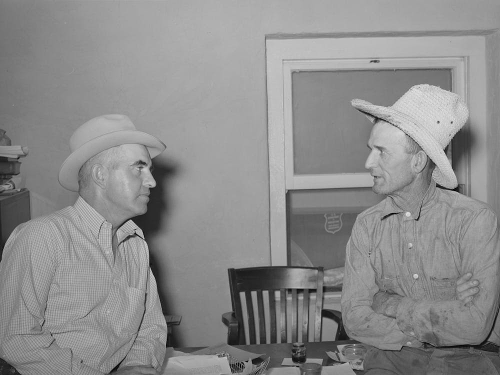 Casa Grande Valley Farms Manager On Left Talking With A Member Of The Cooperative, Pinal County, Arizona By