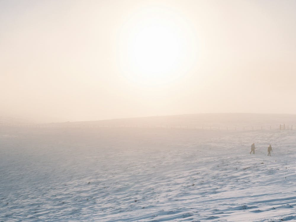 People Walking In The Snow