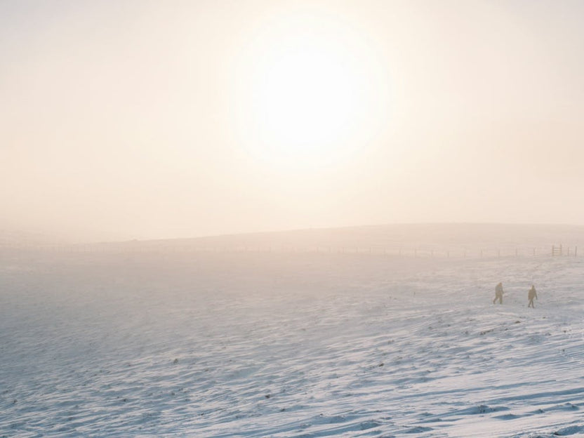 People Walking In The Snow