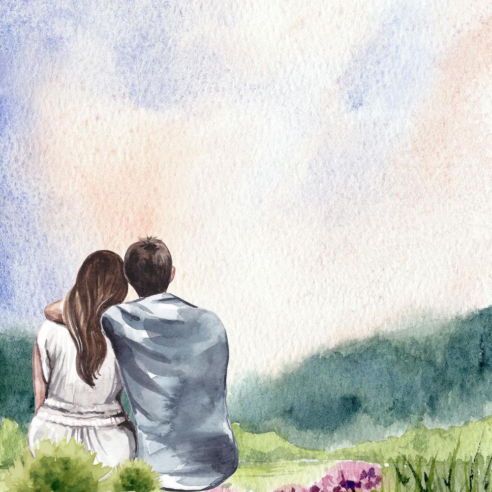 Couple Sitting On The Grass