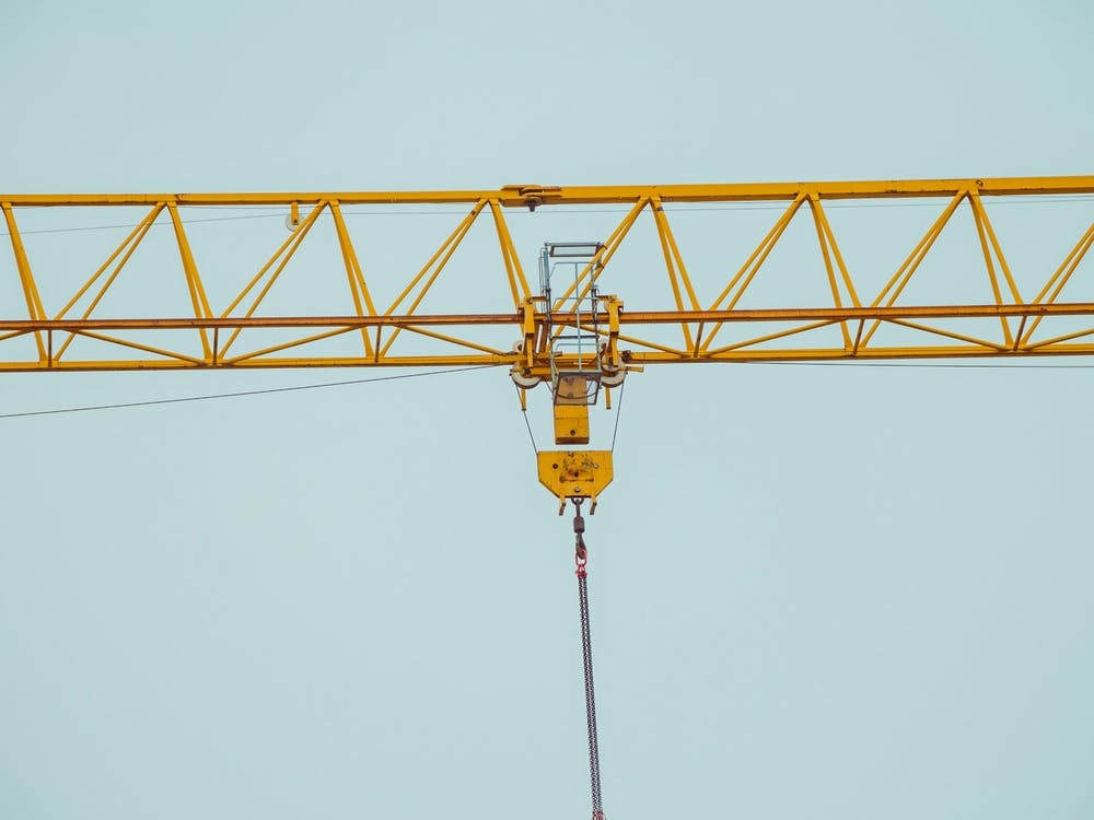 Closeup On Part Of Yellow Construction Crane Chain