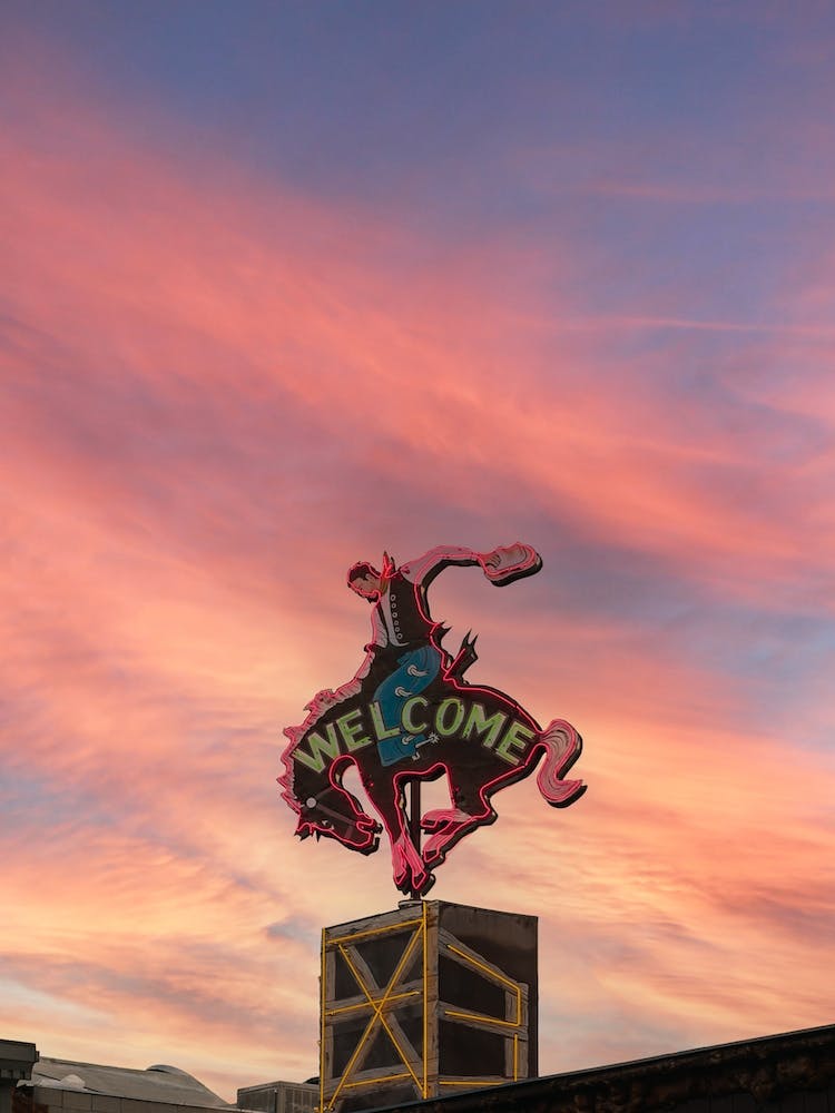 Welcome Rodeo Sign, Pink Sky Art Print by Fy! Photography Archive