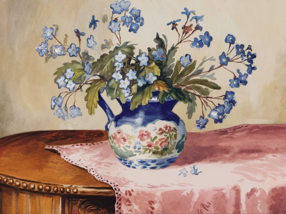 Blue Flowers In A Vase