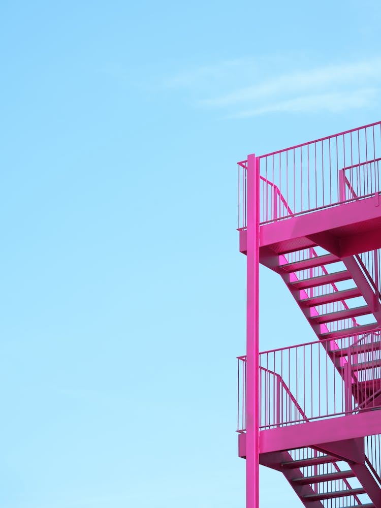 Minimalistic Pink Staircase With Blue Sky Travel