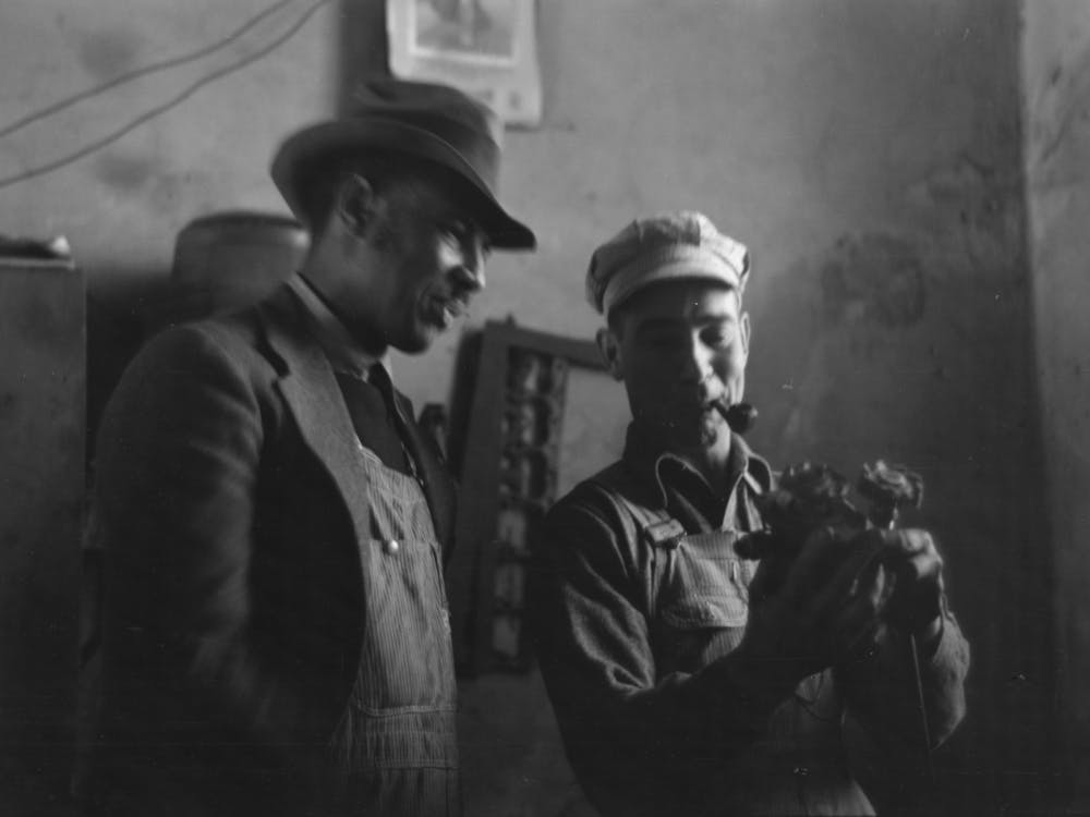 Untitled Photo, Possibly Related To Pomp Hall, Tenant Farmer, Talking To Another Farmer As He Waits At The Smith