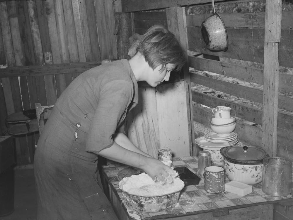 Resident Of Mays Avenue Camp Making Biscuits, Oklahoma City, Oklahoma, See General Caption No, 21 By Russell Lee