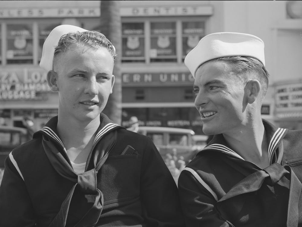 Sailors Talking In Square In Midtown, This Square Is A General Gathering Place, San Diego, California By Russell Lee
