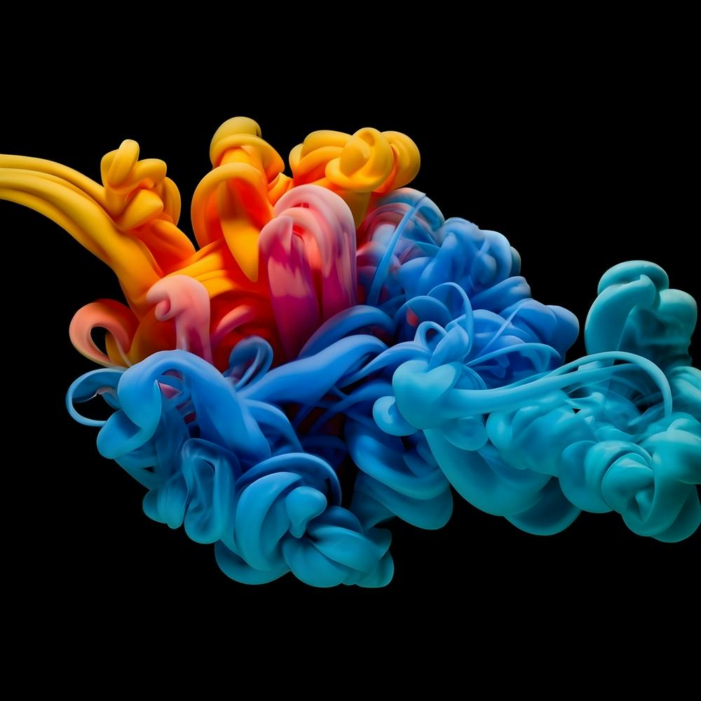 Abstract Long Cloud Of Colourful Smoke On A Blue (1)