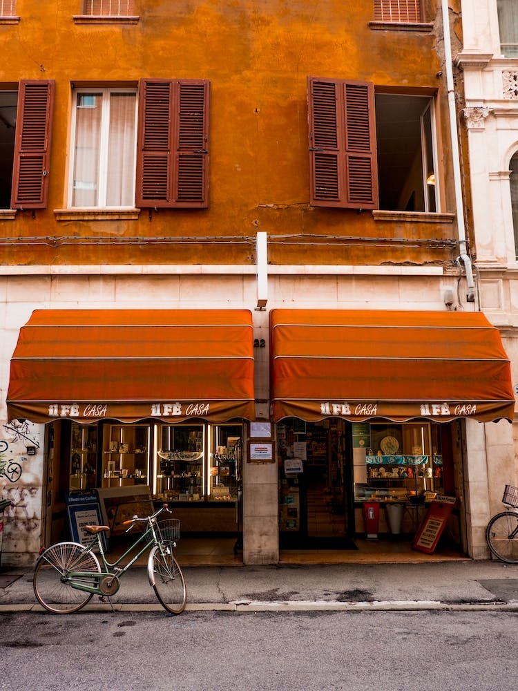 Red Shop And Bike In Ferrara Italy