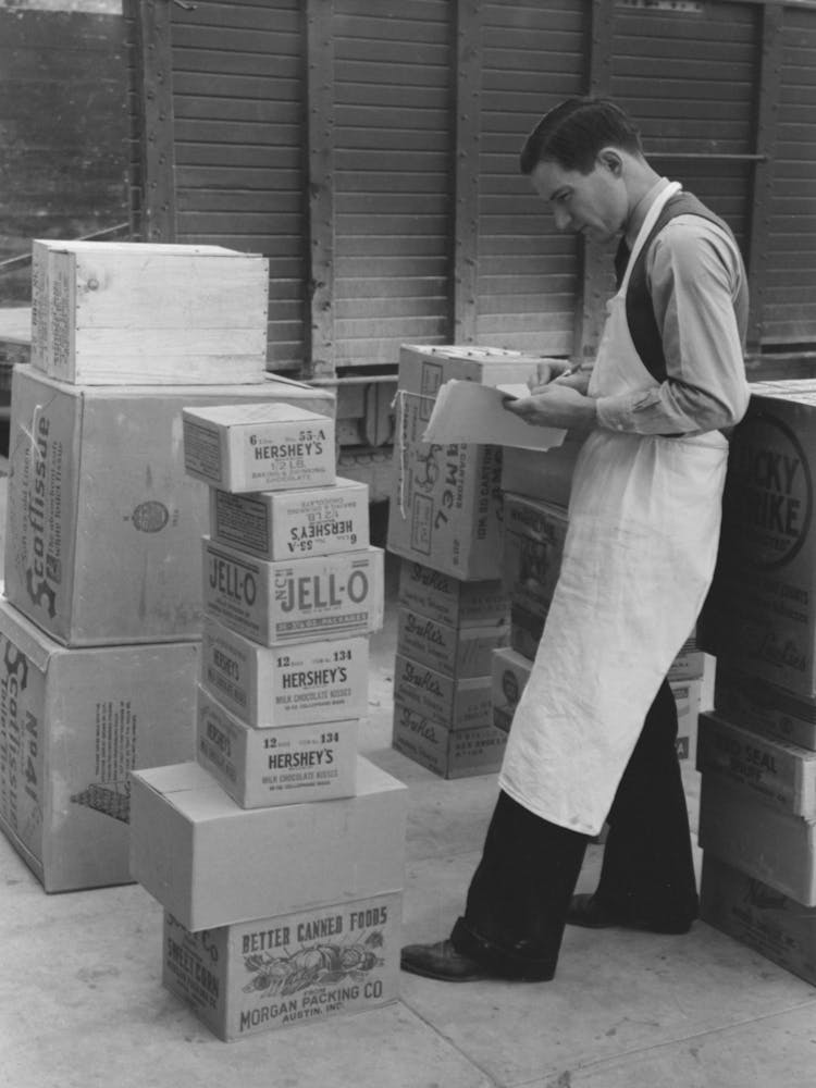 Checking Delivery Of Supplies From Wholesale Grocery Store, San Angelo, Texas By Russell Lee 1