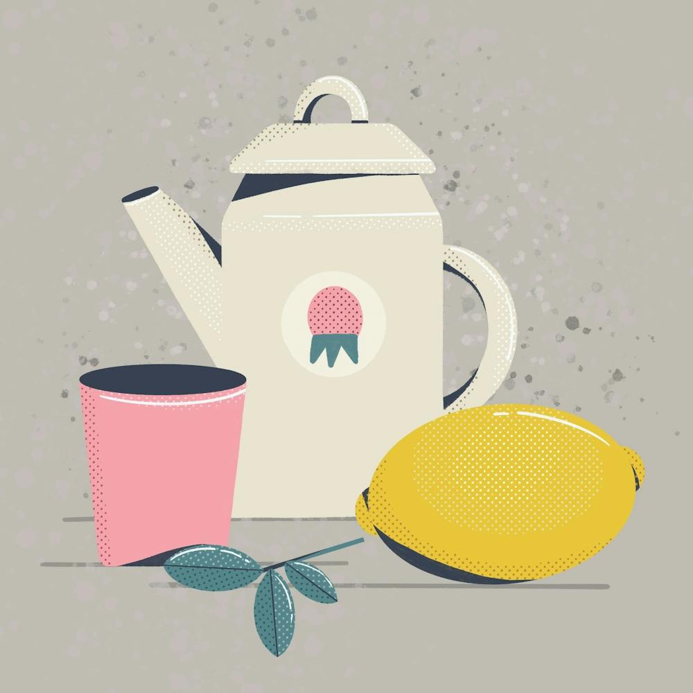 White teapot and lemon