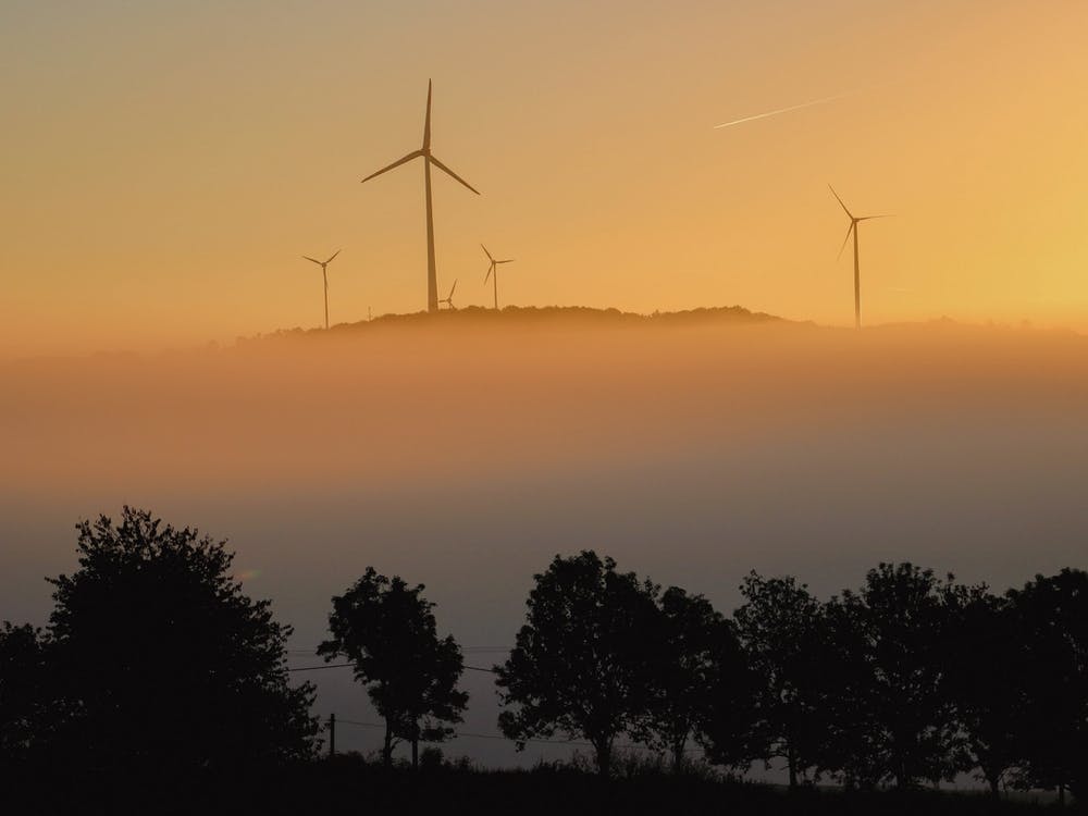 Wind Turbines Sunrise at The Eifel In Germany