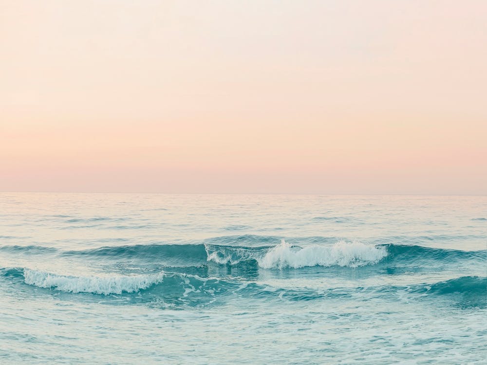 Ocean Waves At Sunset