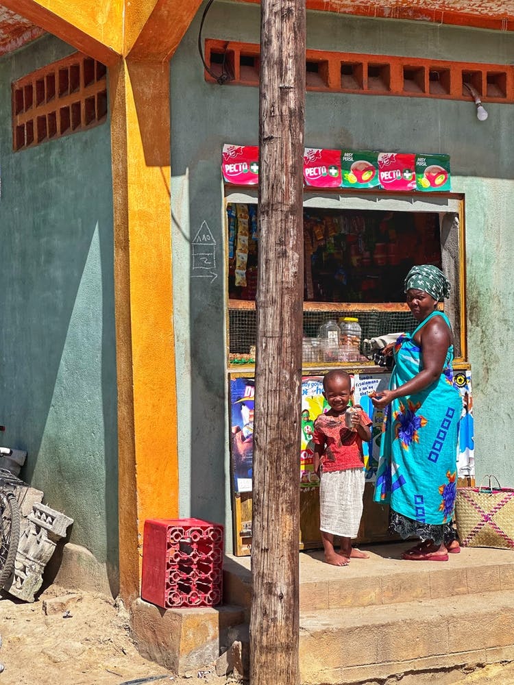 Woman And Child In A Market