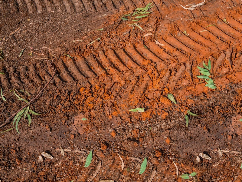 Texture Of Brown Mud With Tractor Tyre Tracks 2
