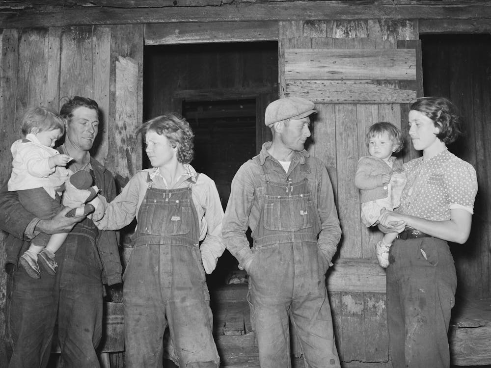 Two Young Couples With Their Children, These Are Migratory Berry Pickers Near Ponchatoula, Louisiana By Russell Lee