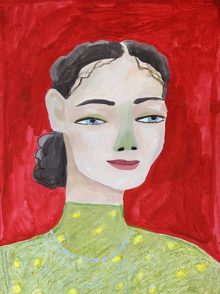 Woman in green sweater on red background