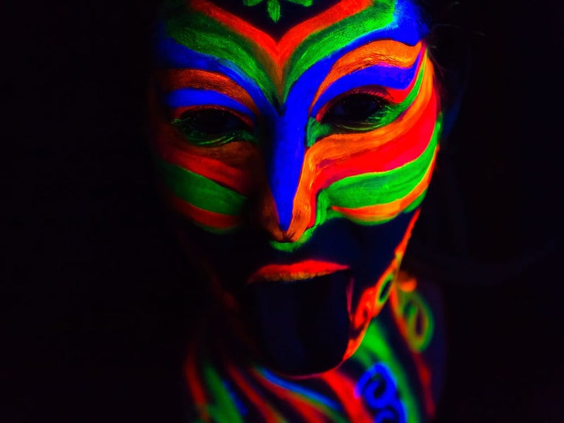 Woman With Make Up Art Of Glowing Uv Fluorescent Powder