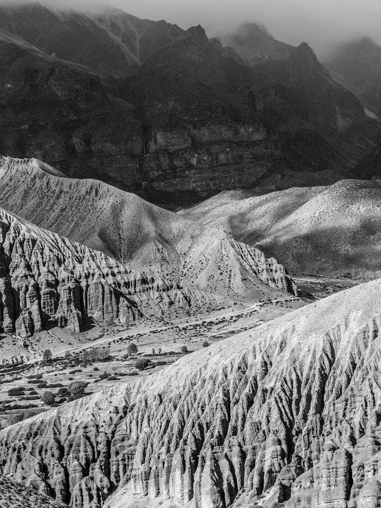 Hiking Through The Himalayas In Black And White