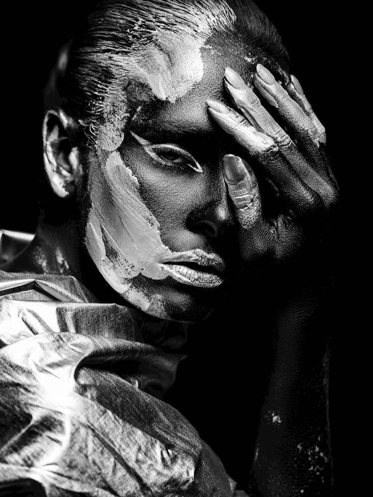 Woman In Silver Makeup