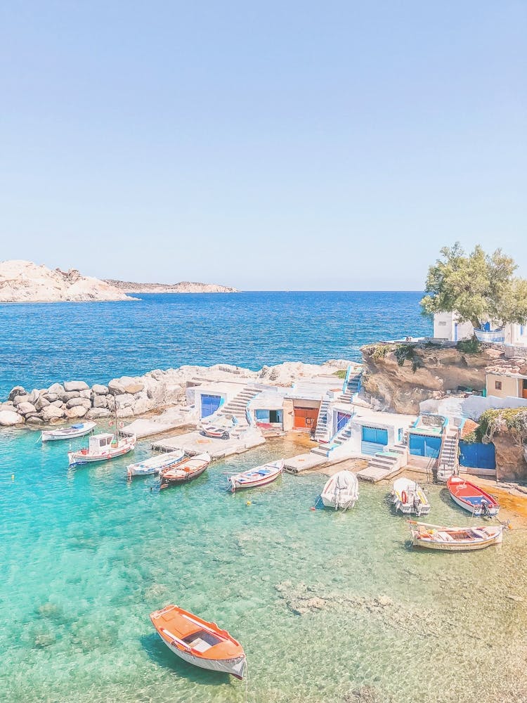 Milos, Greece I Colorful fishing village Mandrakia photography with paradise turquoise water beach in Cyclades with typical white and blue architecture and a magnificent view of the Mediterranean sea ocean