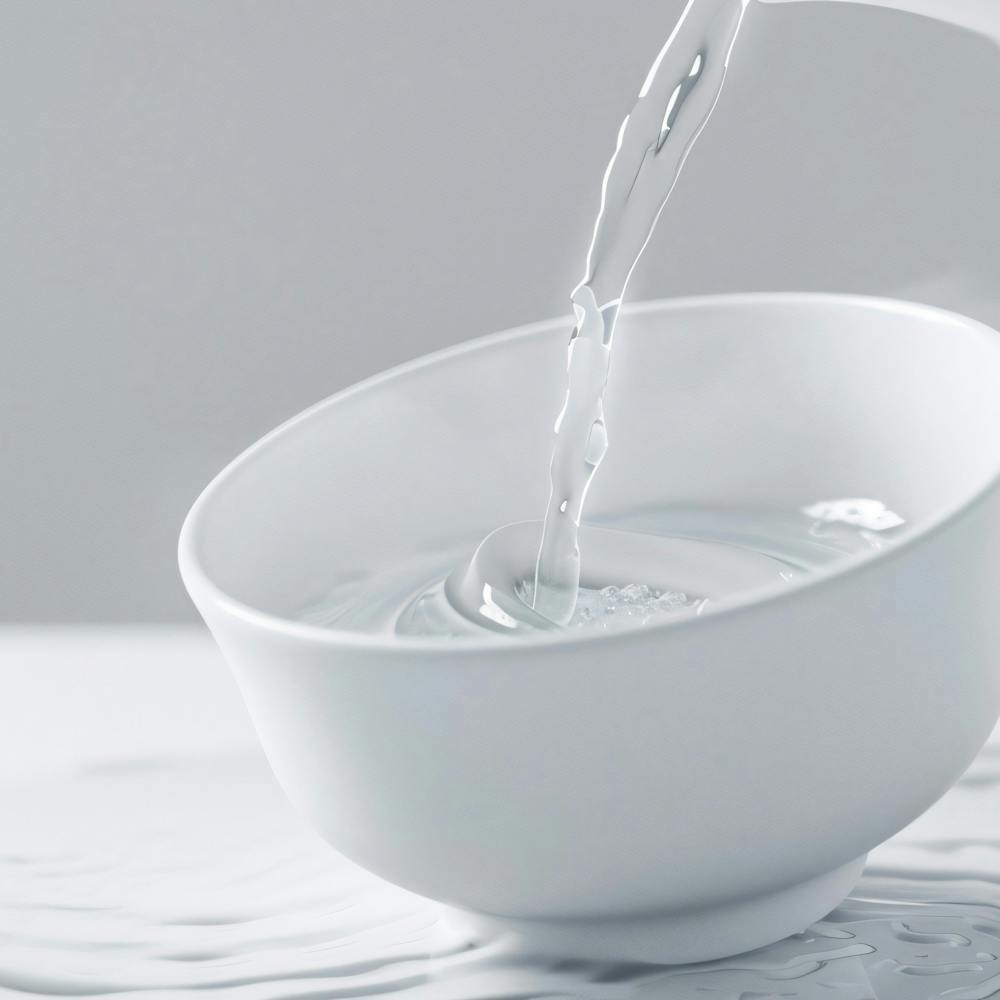 Water Pouring Into A Bowl