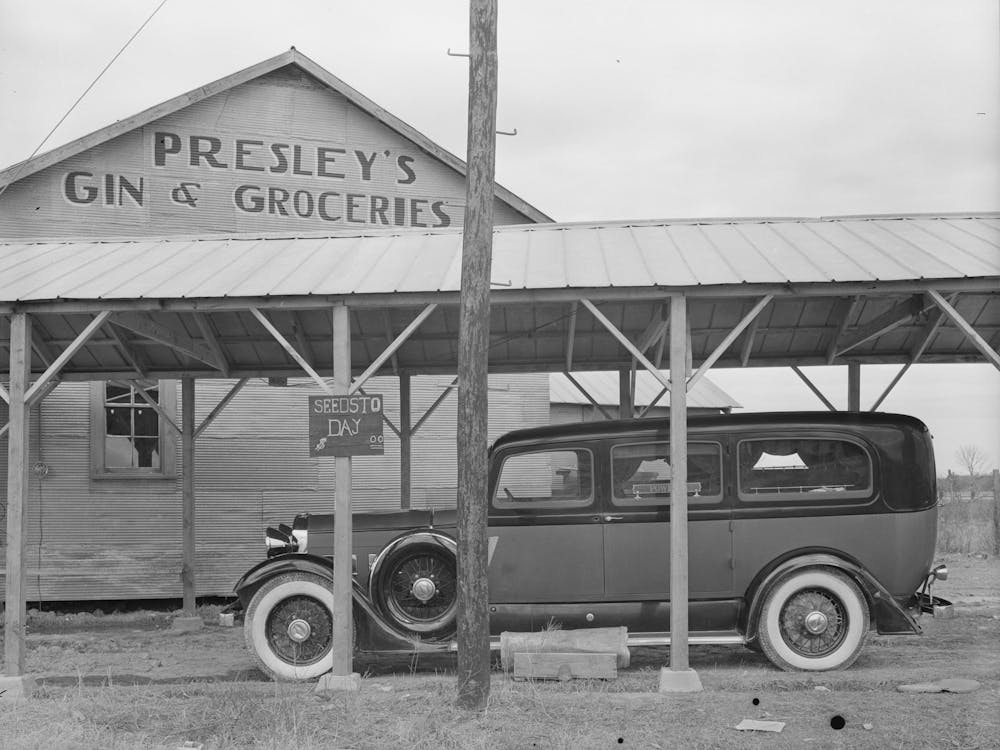 Untitled Photo, Possibly Related To Funeral Ambulance Parked Under Gin Shed, Mound Bayou, Mississippi By