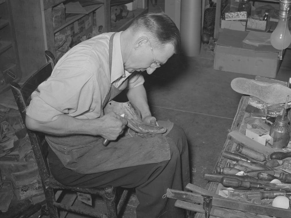 Trimming Inner Sole To Conform To Last, Cowboy Bootmaking Shop, Alpine, Texas By Russell Lee