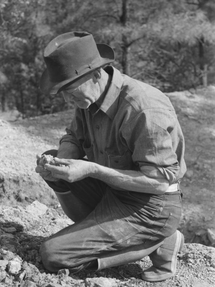 Prospector Examining A Piece Of Rock, Pinos Altos, New Mexico By Russell Lee