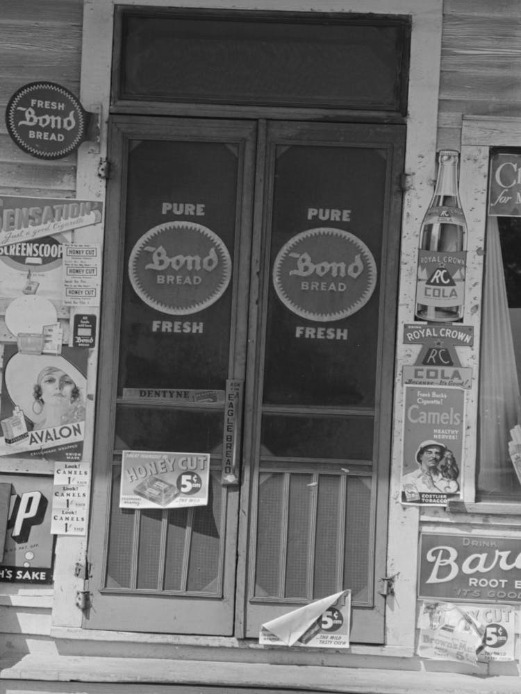 Entrance To Store, Kenner, Louisiana By Russell Lee