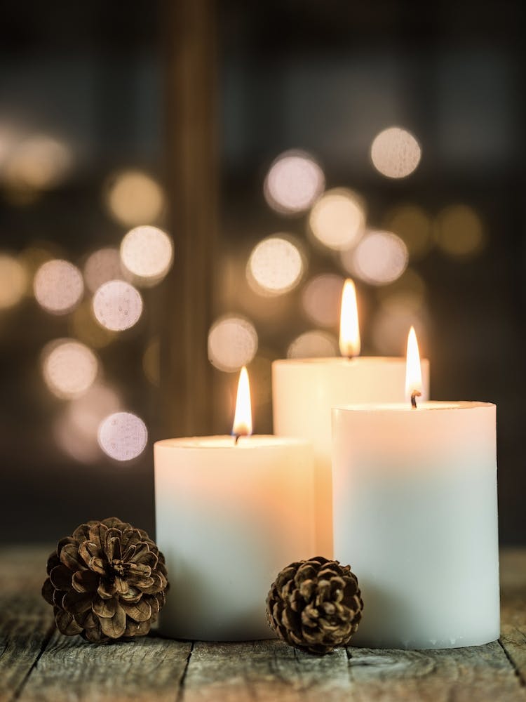 Christmas Advent Candle light decoration on wood background
