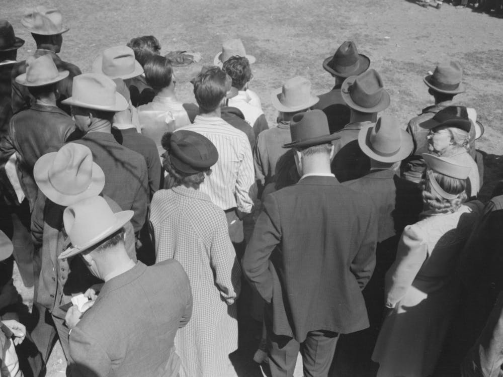 Backs Of Spectators At A Sideshow, San Angelo Fat Stock Show, San Angelo, Texas By Russell Lee