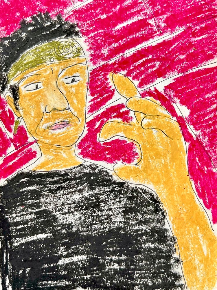 Man Holding A Sign