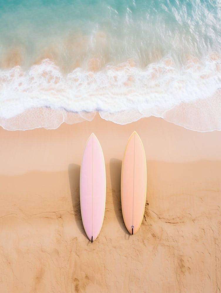 surfboards laying on the beach 6