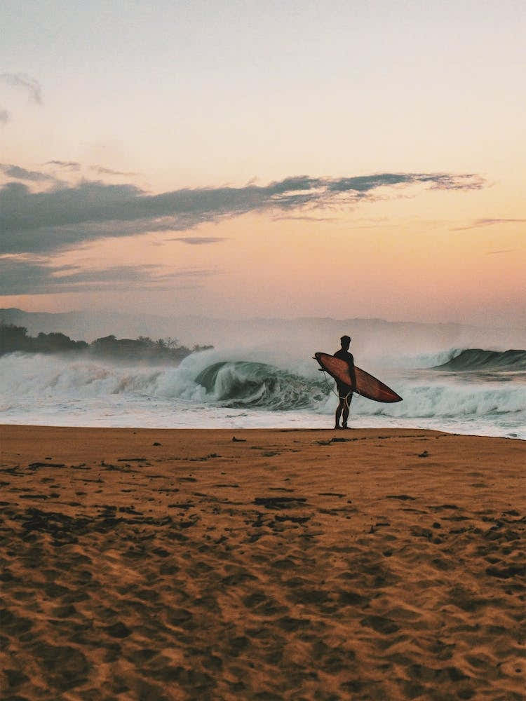 Surfing At Sunset