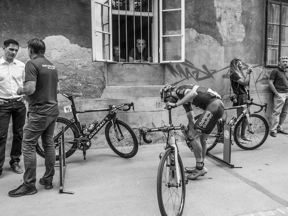 Cyclist And Spectators