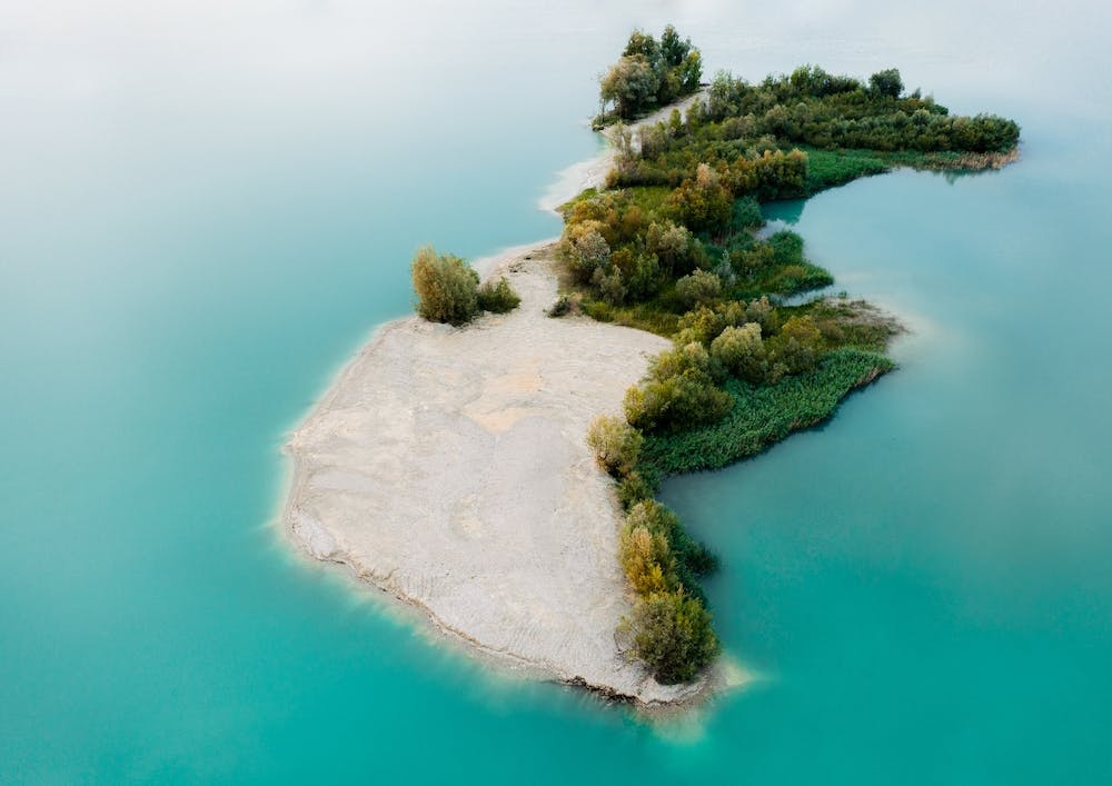Magical Island In A Calm Lake